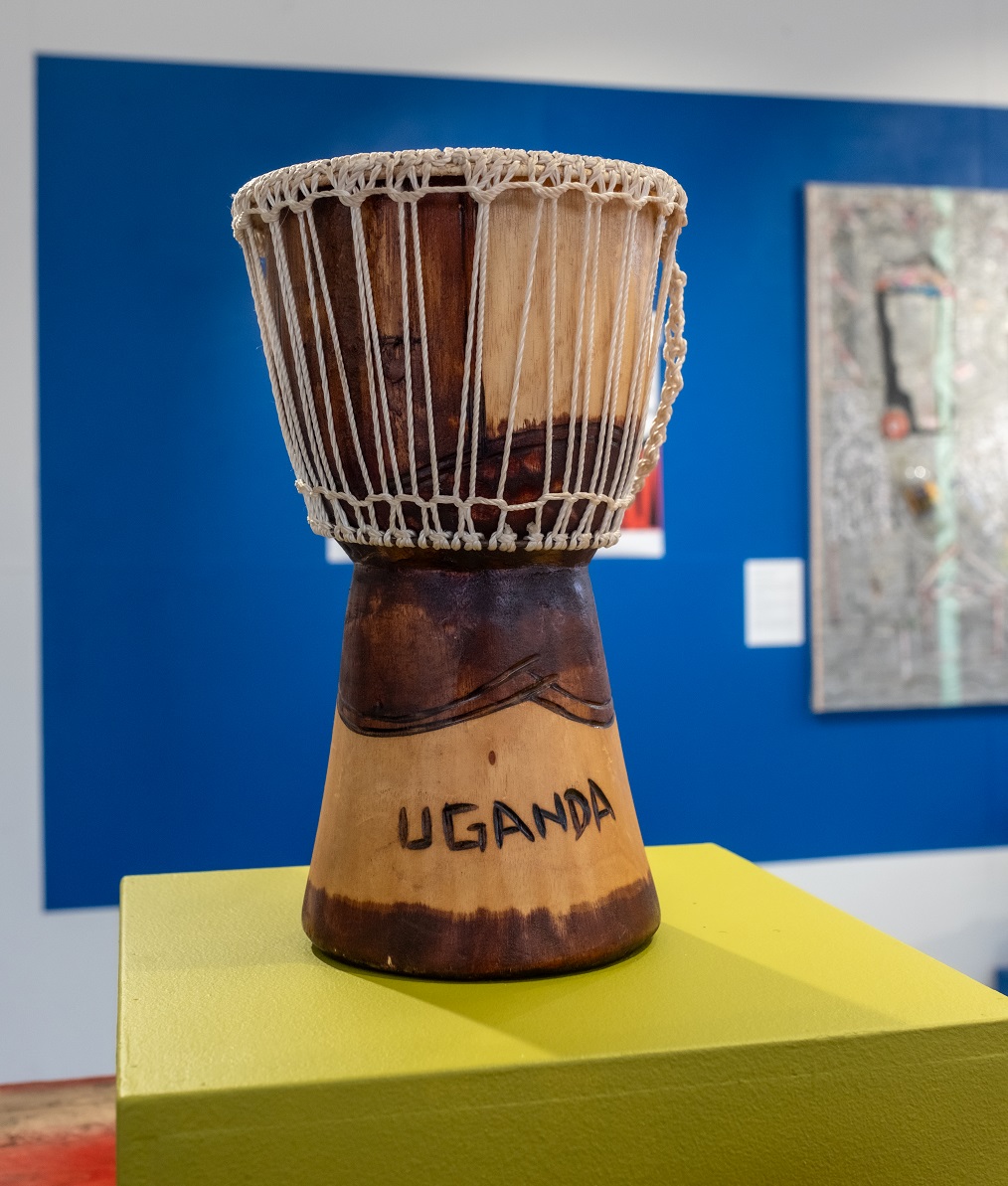 a Ugandan drum on a green plinth